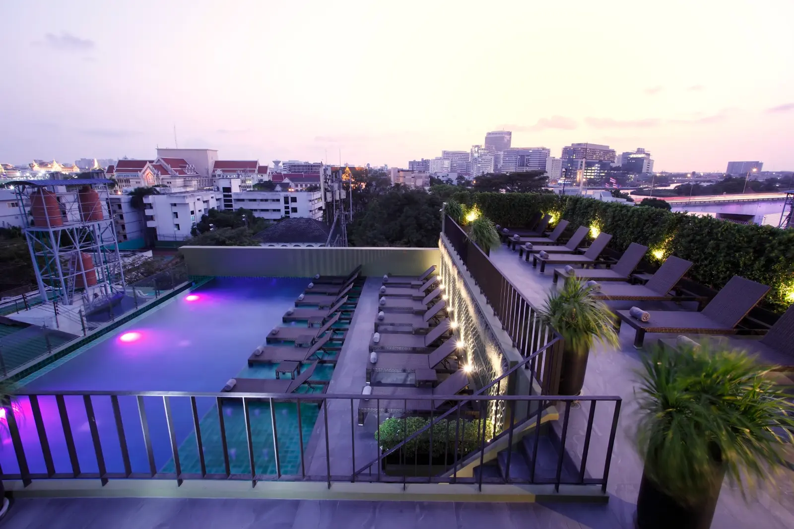 Chillax Heritage rooftop swimming pool at sunset