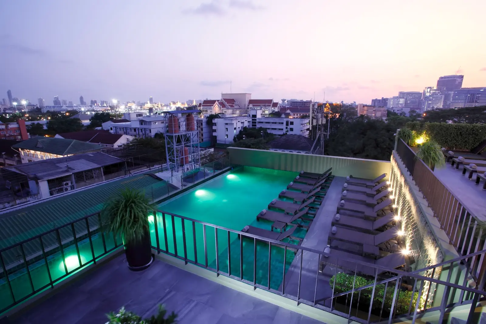 Chillax Heritage rooftop swimming pool overlooking Bangkok at sunset